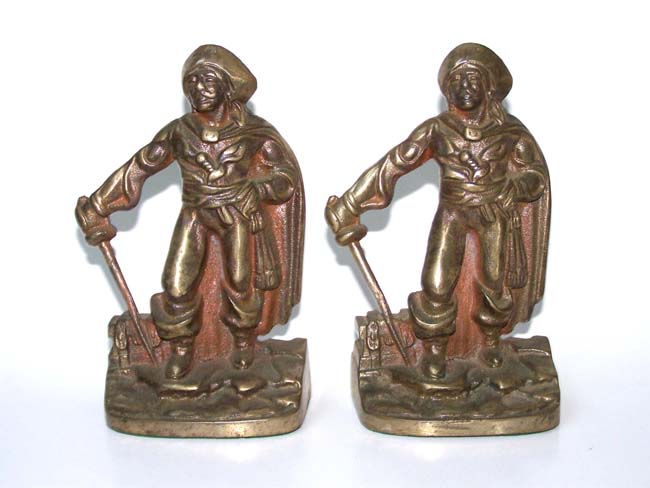 A pair of Antique Bookends circa 1928 depicting a Pirate with his sword
